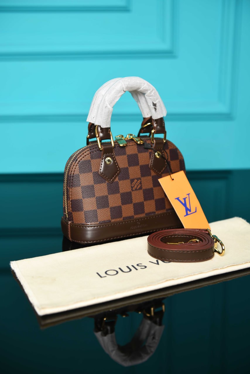 LOUIS VUITTON — Sacs Femme