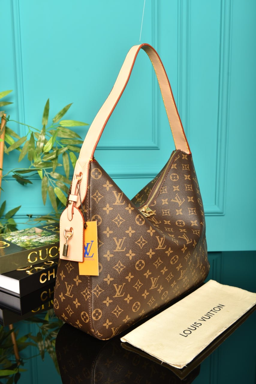 LOUIS VUITTON — Sacs Femme